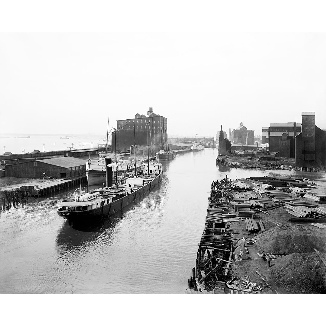 A vintage snapshot of a pier in Buffalo, New York, with ships arriving and docked