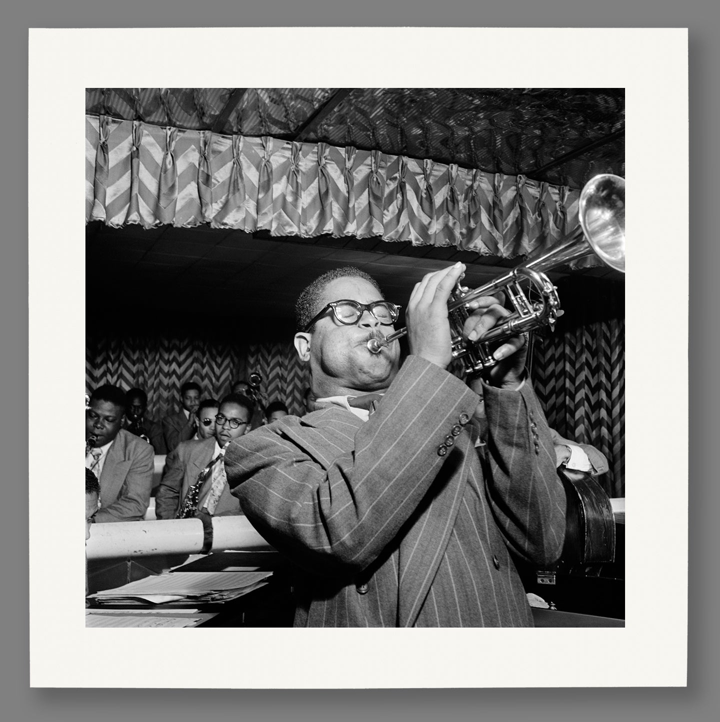 Paper print mockup of vintage photo of Dizzy Gillespie performing with other musicians