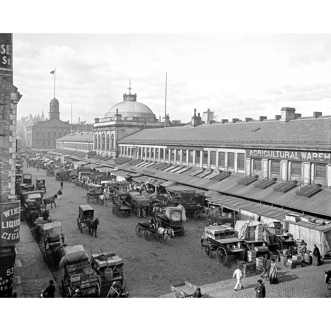 A vintage photograph of daily activity at Quincy Market in Boston