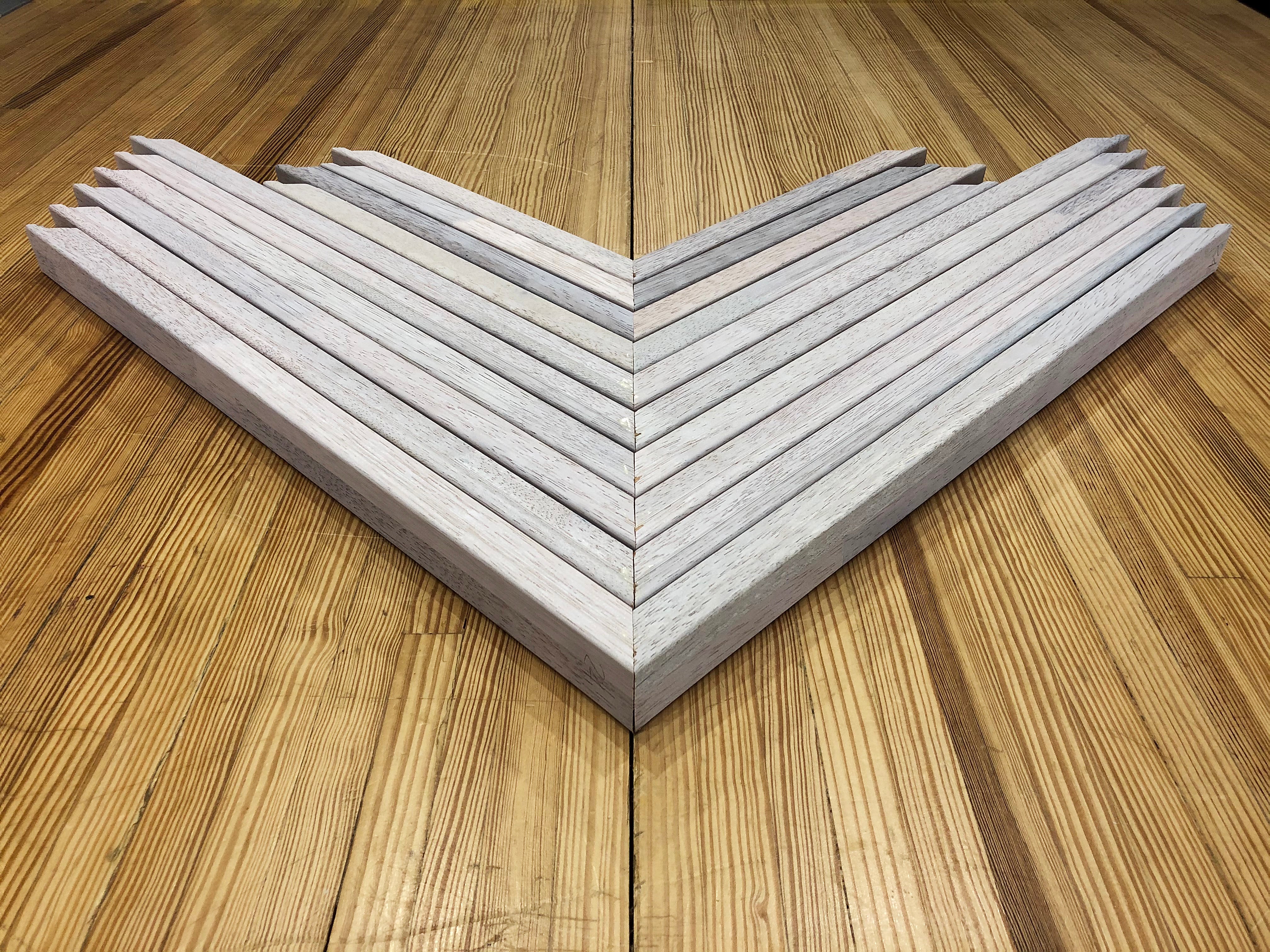 Stretcher bars making an arrow shape