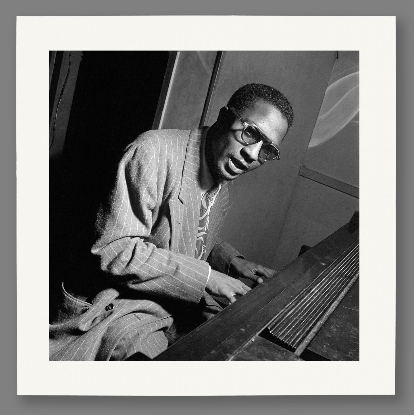 Paper print mockup of a vintage photo of Thelonious Monk performing live