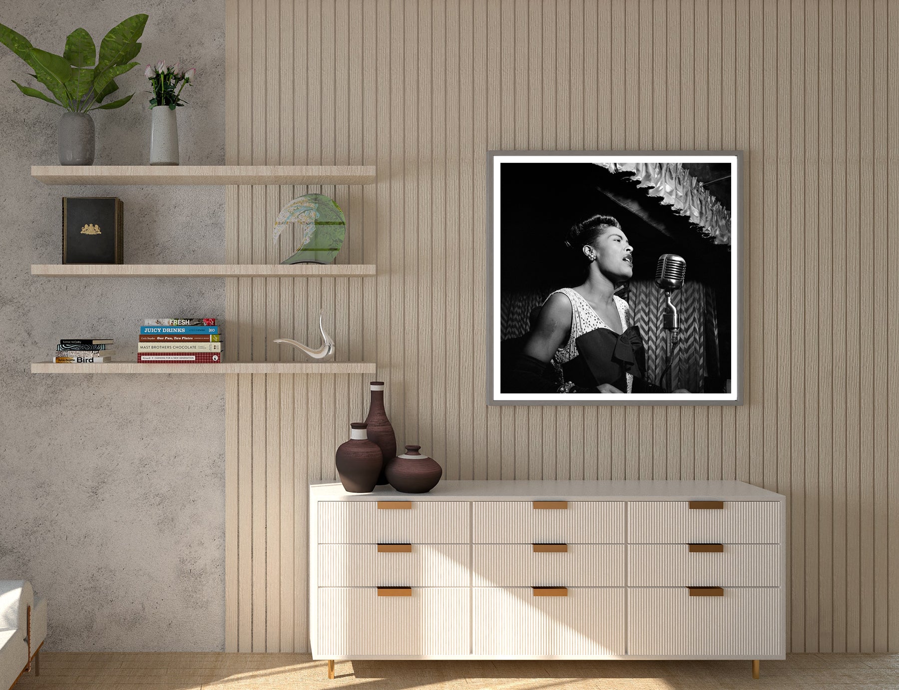 A framed print of a photograph of Billie Holiday hanging on a wall above a set of drawers