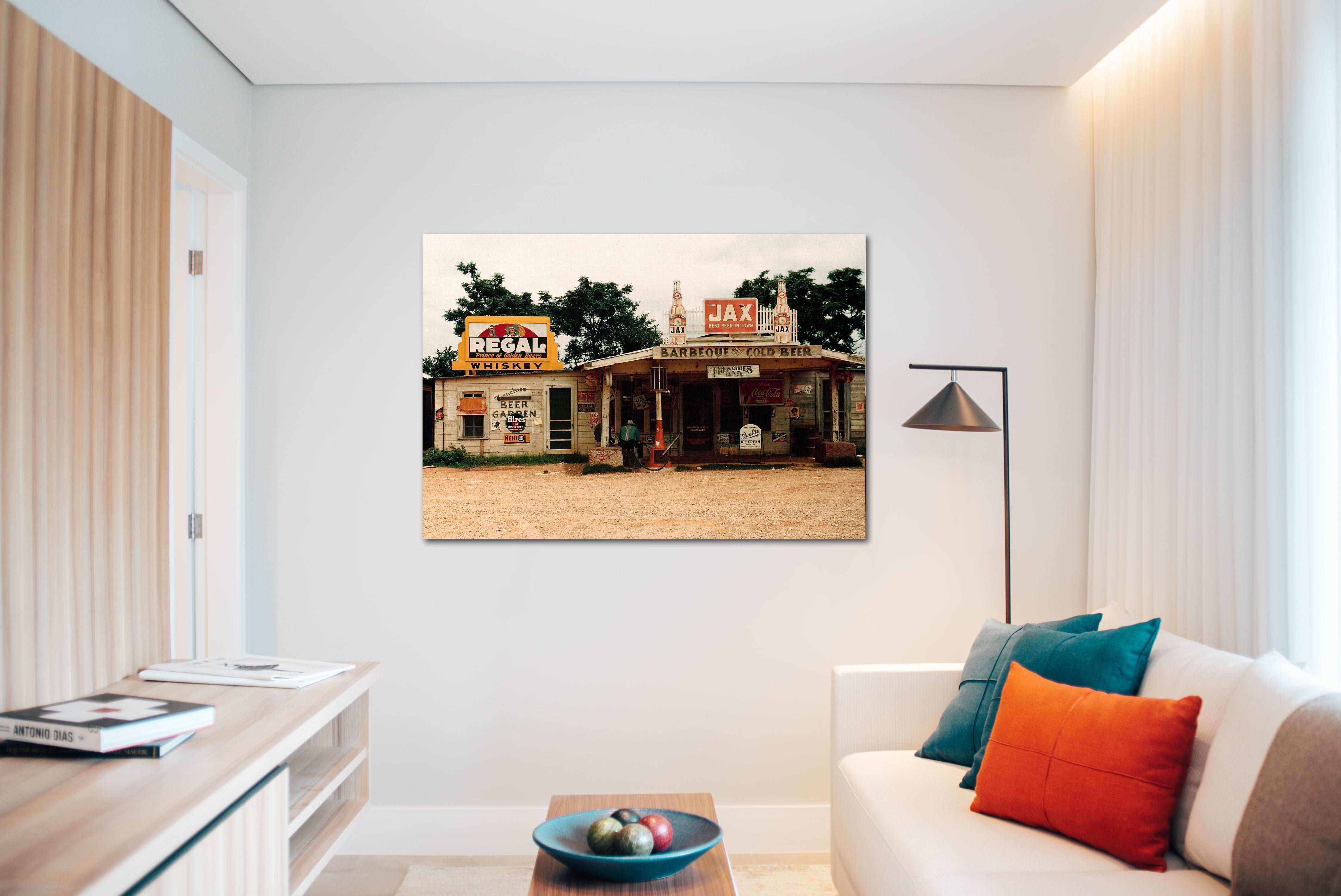 A vintage photograph printed on canvas, hanging in a modern living room