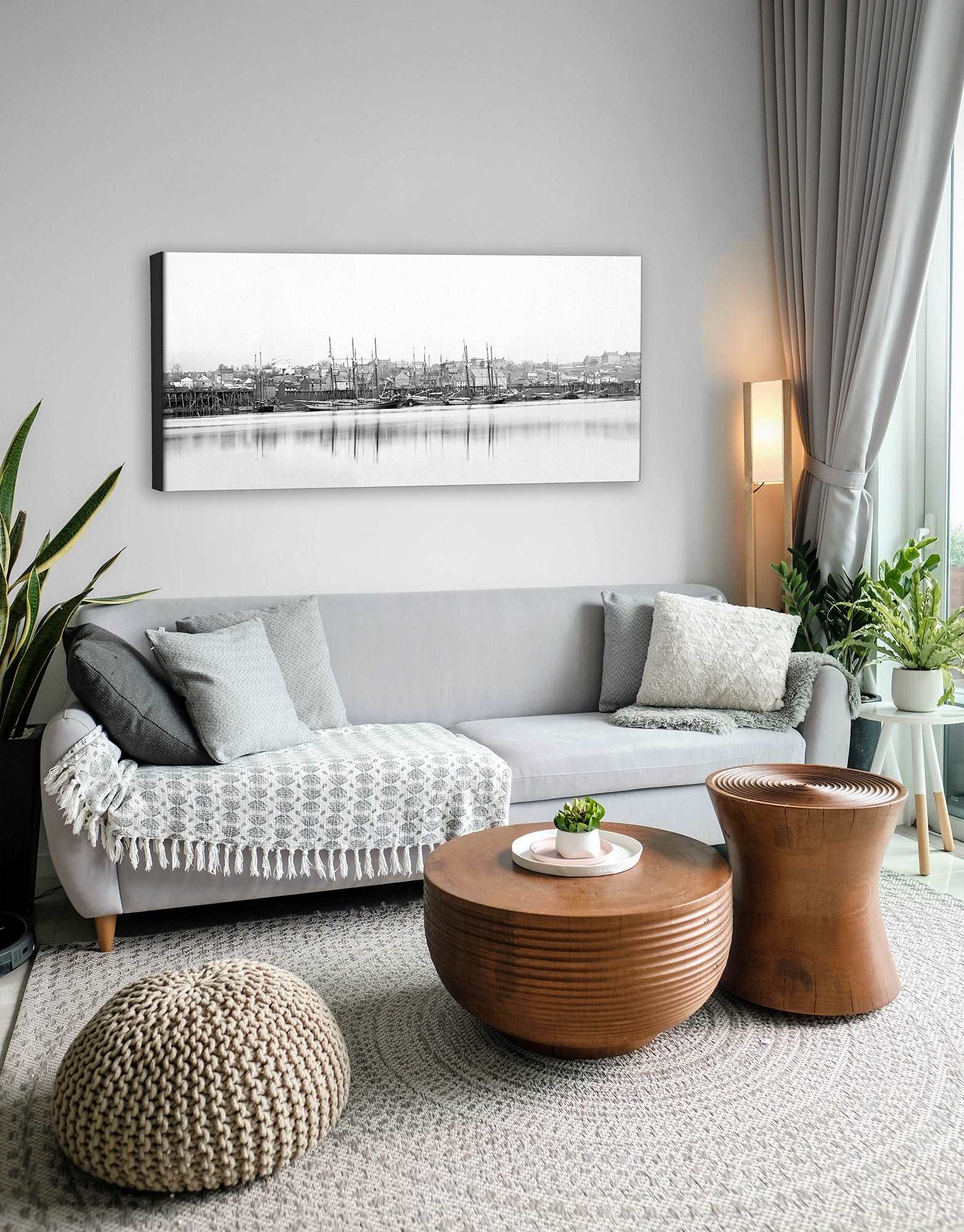 A canvas reproduction print of the Georgetown Waterfront hanging above a couch