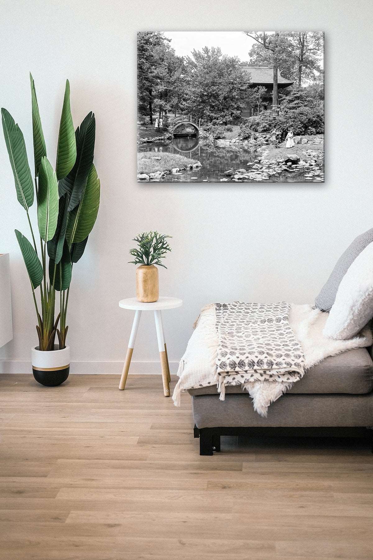 A photograph of a living room with a canvas print of a photograph of Fairmount Park in Philadelphia
