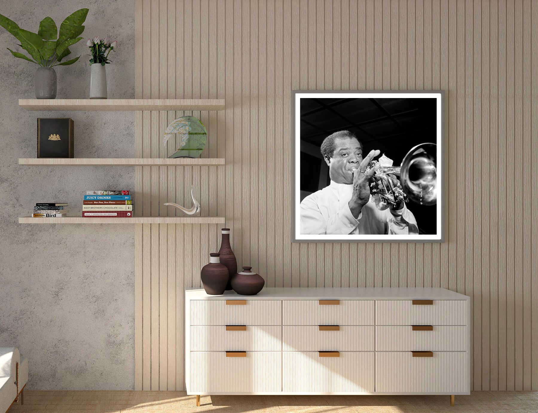 A framed print of Louis Armstrong displayed on a slatted wall above a storage table