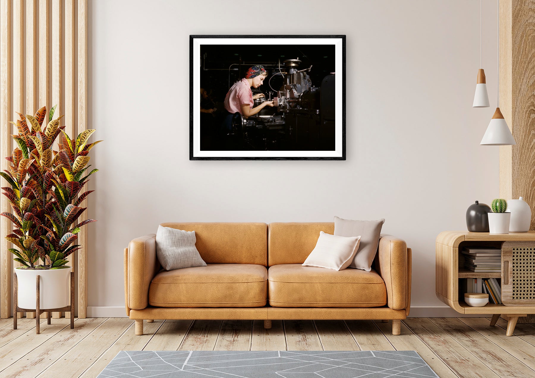 A digital rendering of a living room with a framed paper print of a vintage photograph hanging above a couch
