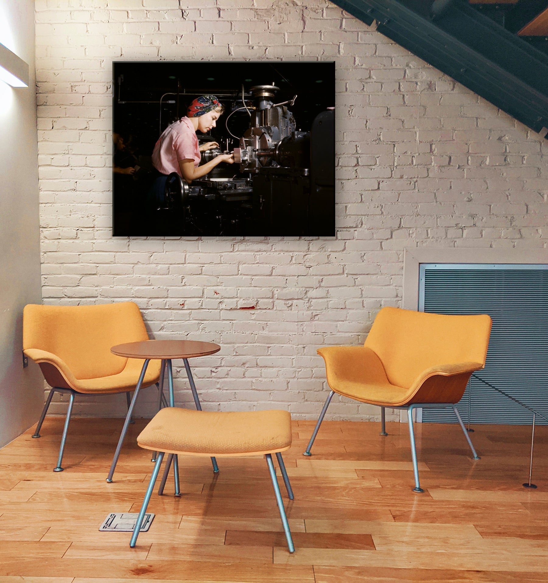 Digital Rendering of an office space with a canvas print of a vintage photogrpah of a woman working with aircraft machinery
