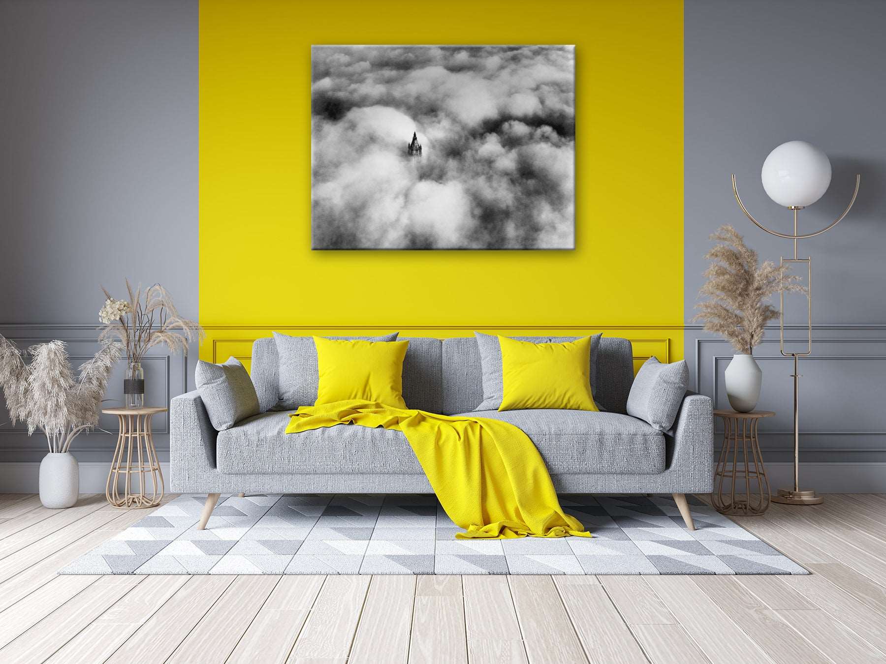 A rendering of a canvas print reproduction of Woolworth Tower in the Clouds, NYC photograph hanging in a yellow living room