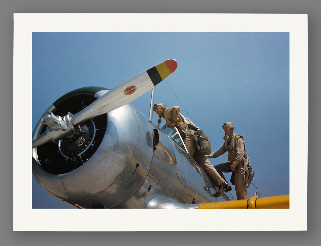 A paper print of a vintage color photo of aviation cadets