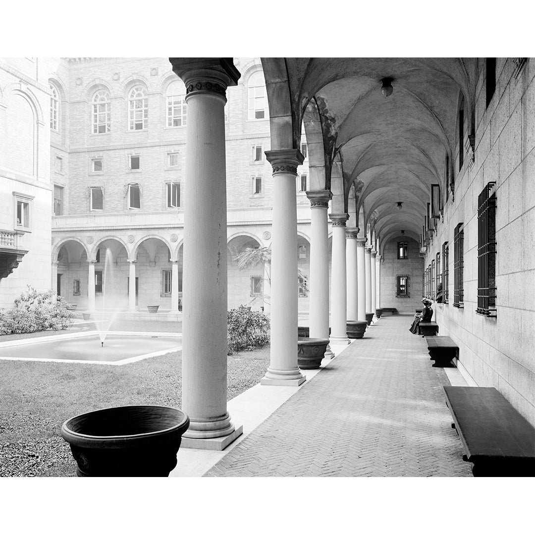 A black and white vintage image featuring the courtyard of the Boston Public Library