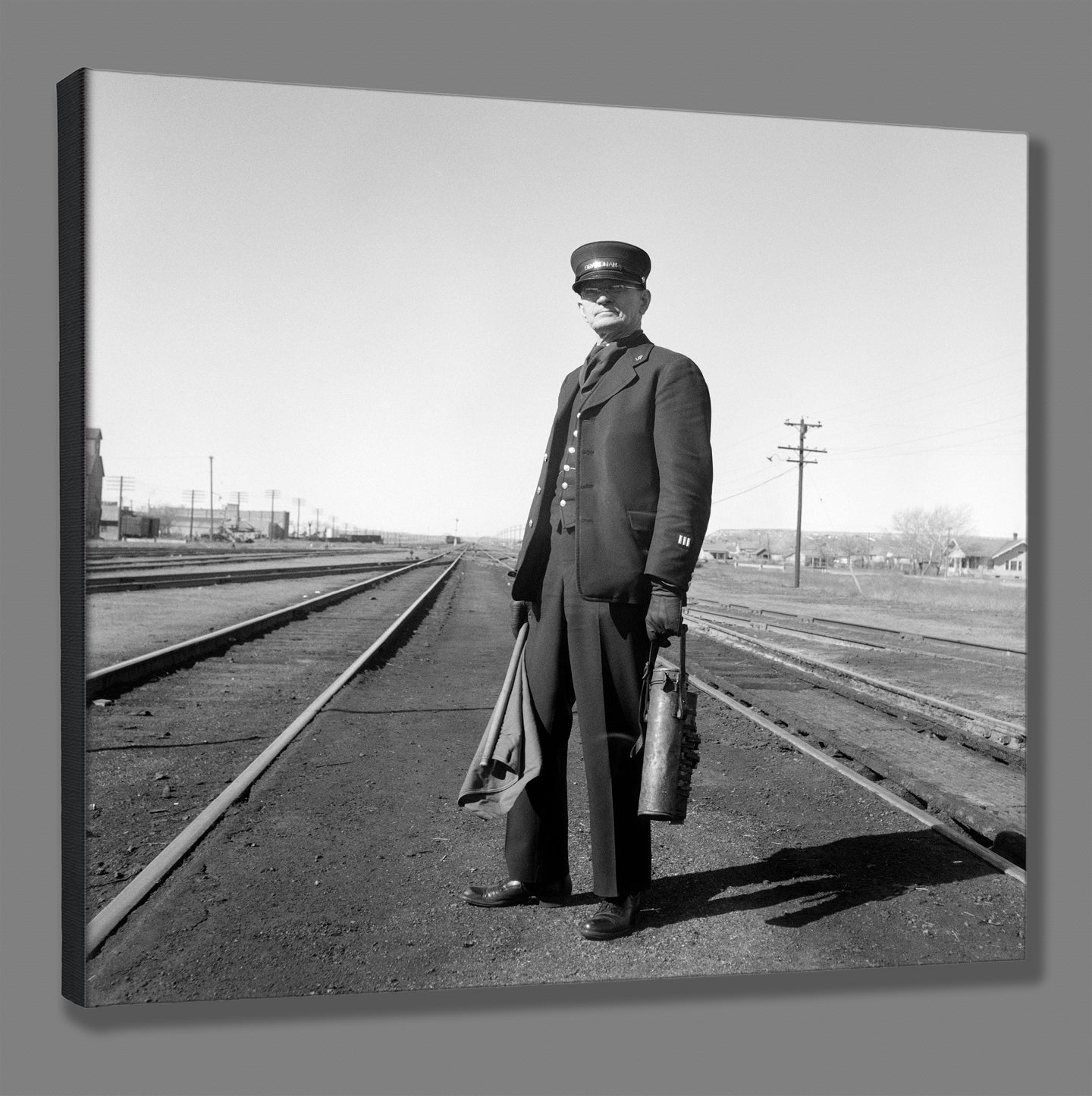 A stretched canvas print of a vintage Dorothea Lange photograph of a brakeman in Nevada