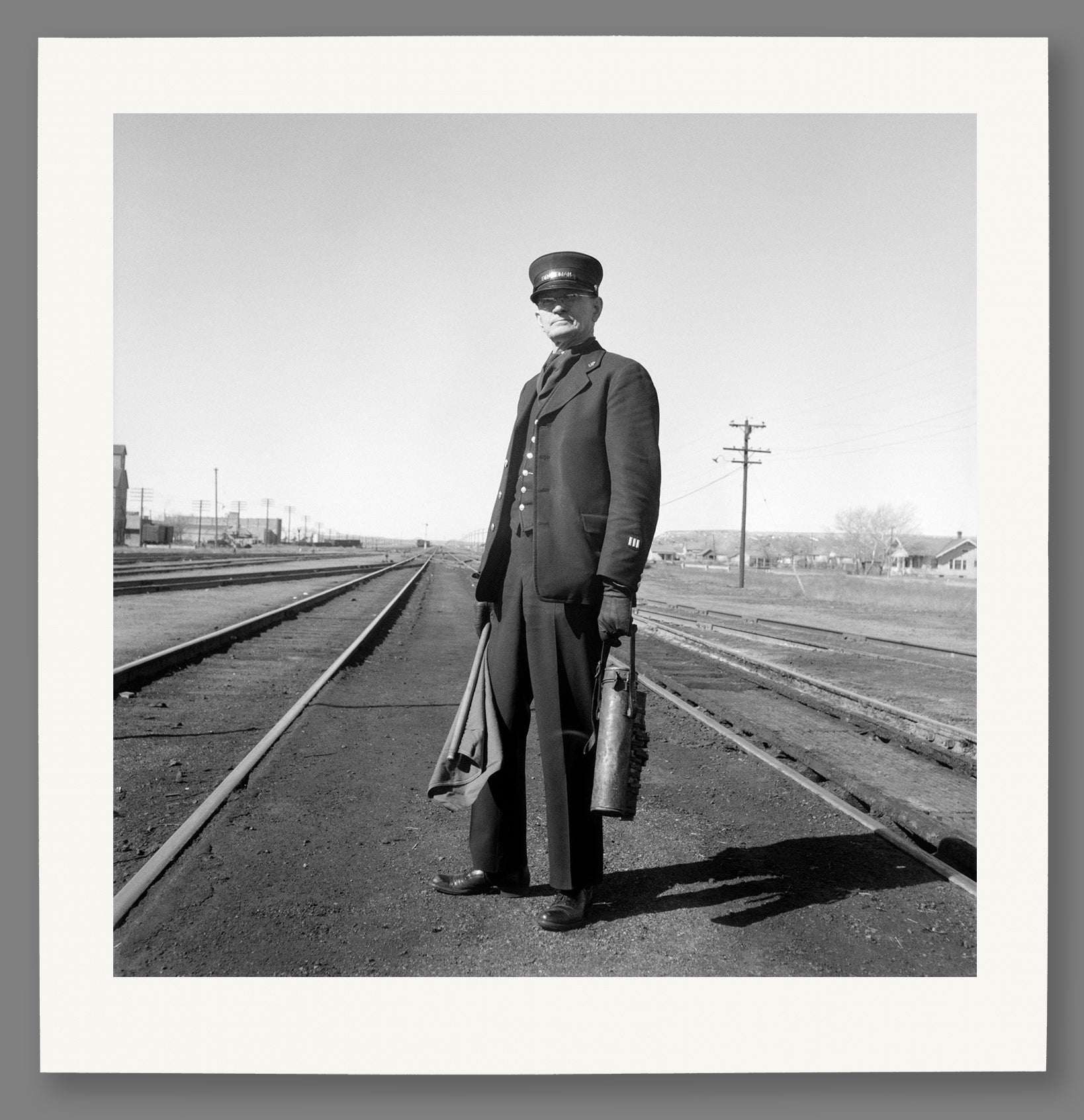 A paper print of a vintage photograph of a Nevada Brakeman