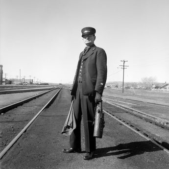 A vintage photograph by Dorothea Lange of a railway Brakeman in Nevada