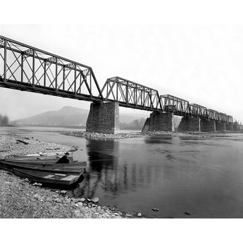 A vintage photograph of a bridge in Pittston, PA crossing the Susquehanna River