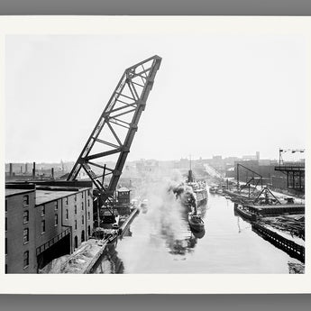 A fine art paper print of a vintage photograph of a lift bridge n Cleveland, Ohio, elevated to allow ships to pass underneath