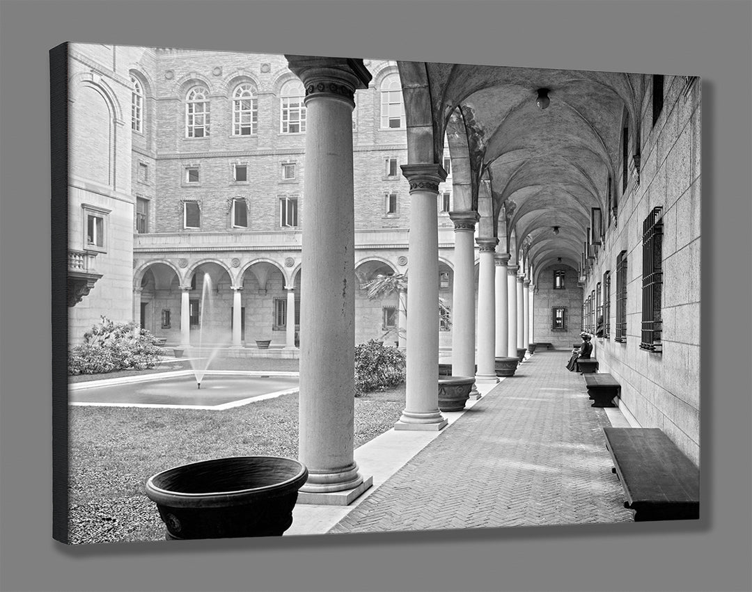 A mockup of a canvas print of a vintage photograph of the courtyard at the Boston Public Library