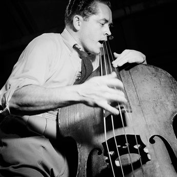 Vintage photo of Eddie Safranski playing live music