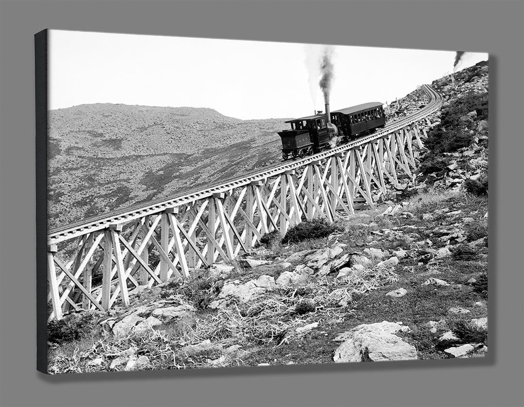 A stretched canvas print featuring a vintage image of a train on the elevated tracks on New Hampshire's Mt. Washington