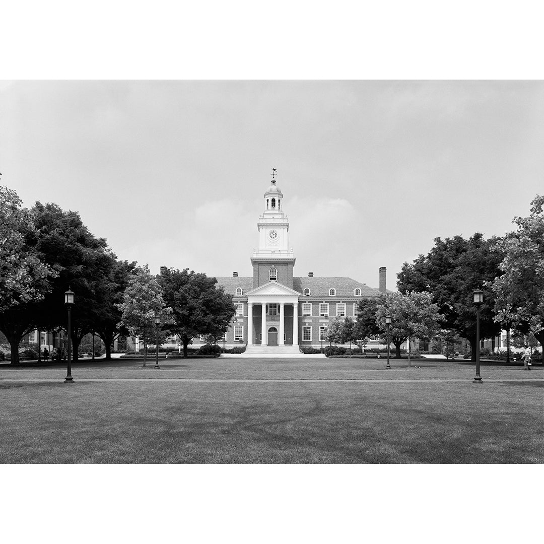 A black and white photograph of Gilman Hall at Johns Hopkins Univeristy