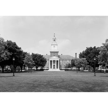 A black and white photograph of Gilman Hall at Johns Hopkins Univeristy