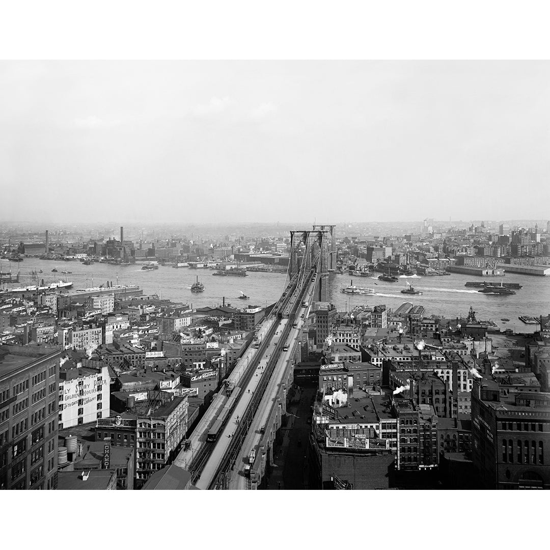 A vintage photograph of the Brooklyn Bridge and NYC skyline