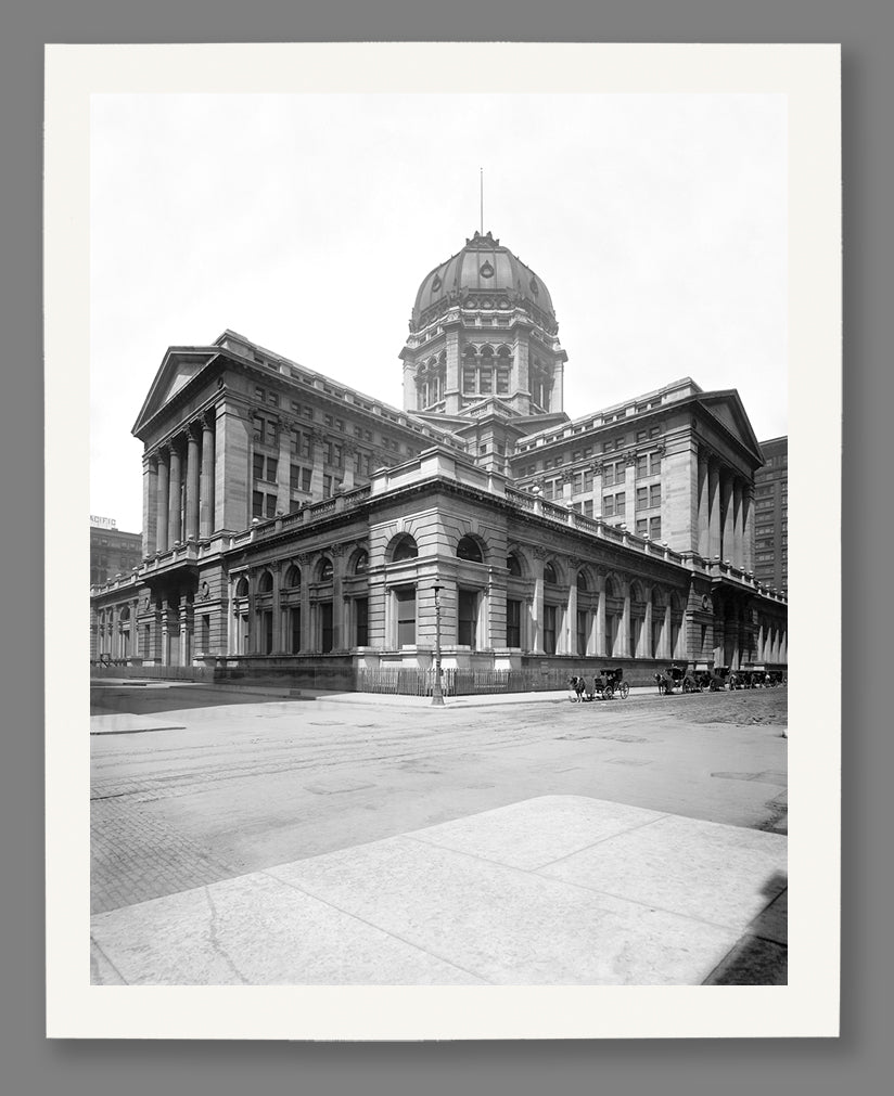 A paper print of a vintage Chicago photograph featuring the Post Office building