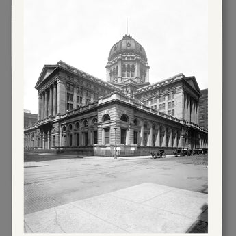 A paper print of a vintage Chicago photograph featuring the Post Office building