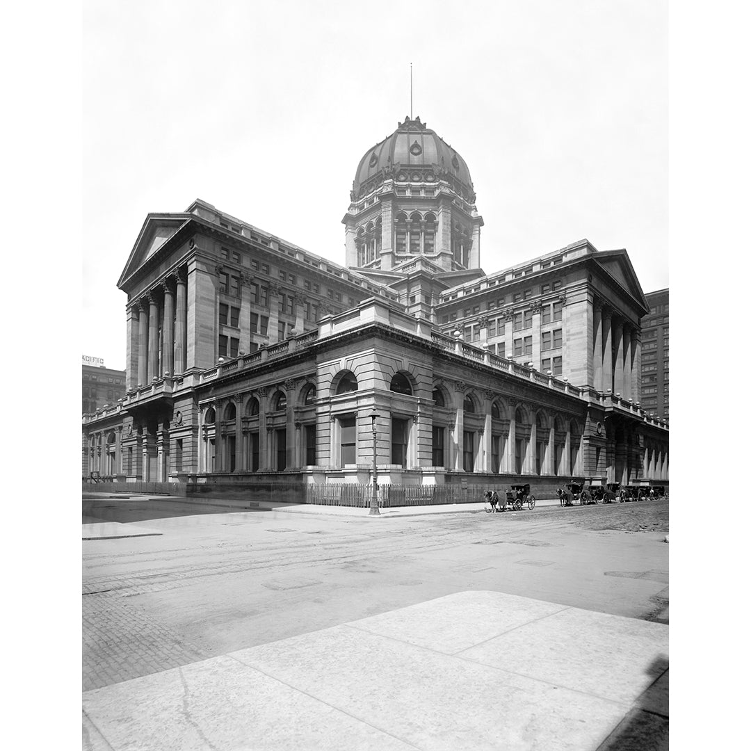 A vintage photograph featuring the Post Office building in Chicago