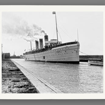 A fine art paper print of a vintage photograph of a steam ship passing the locks at Sault Ste Marie
