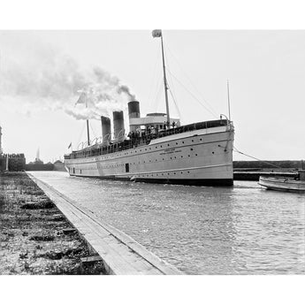A vintage, black and white photograph of the SS Northland at the locks at Sault Ste Marie