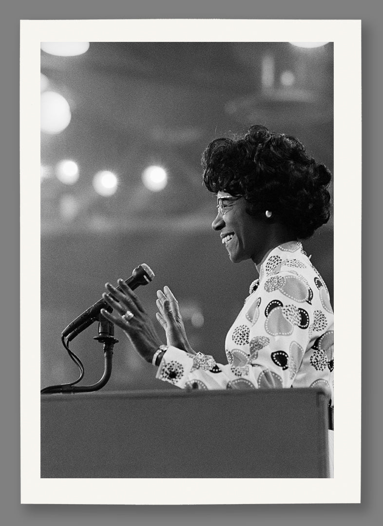 A fine art paper print of a vintage image of Shirley Chisholm speaking at the Miami Beach DNC