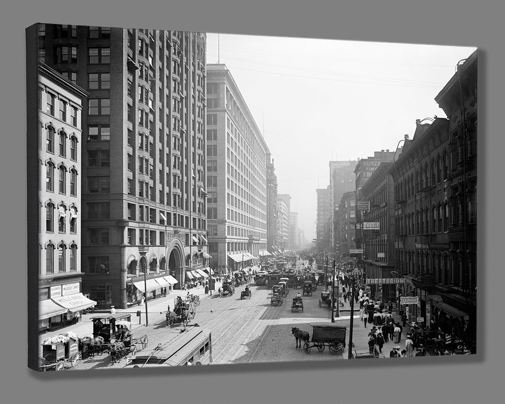 A stretched canvas print reproduction of a vintage photograph showing daily life on Chicago's State Street
