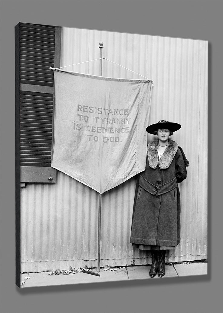 A stretched canvas print of a vintage photograph of a suffragette with a banner