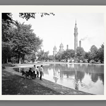 A mockup of a paper print of a restored vintage photo of boys in Detroit's Water Works Park