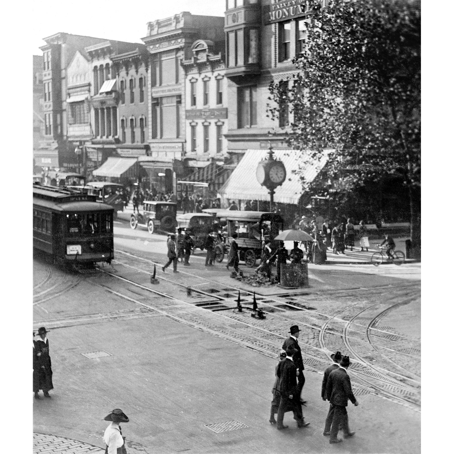 A vintage photograph of a street scene on 11th & F Streets in Washington DC