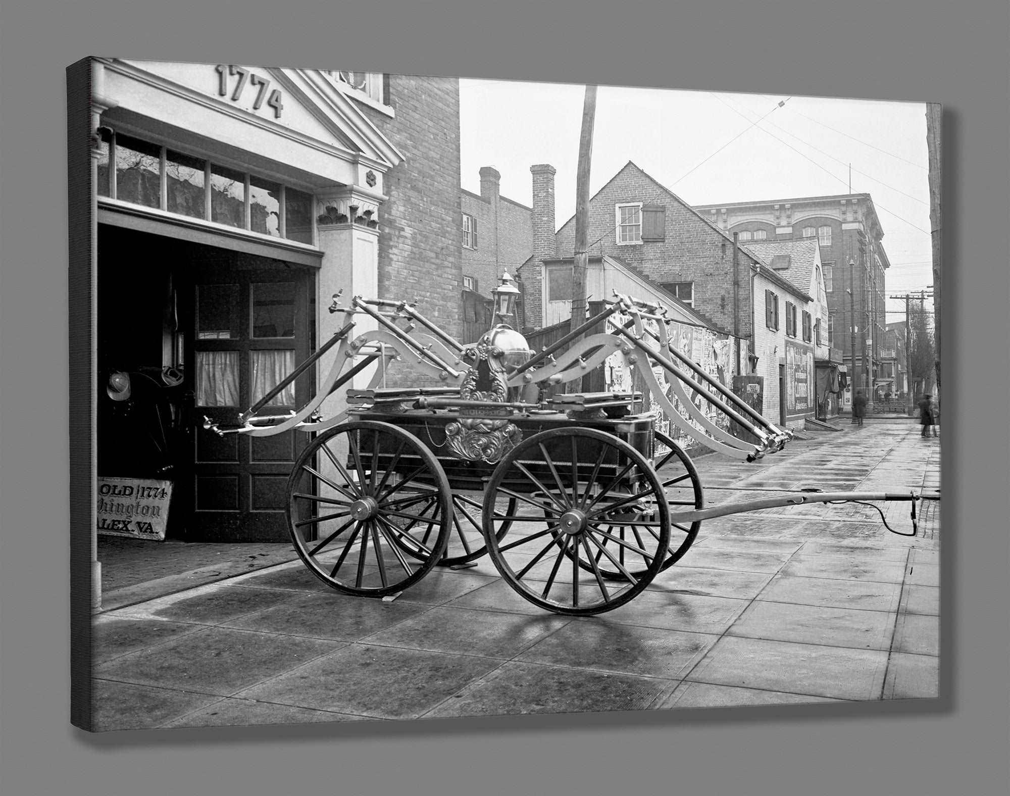 A reproduction print on canvas of a photograph of a vintage Alexandria fire engine