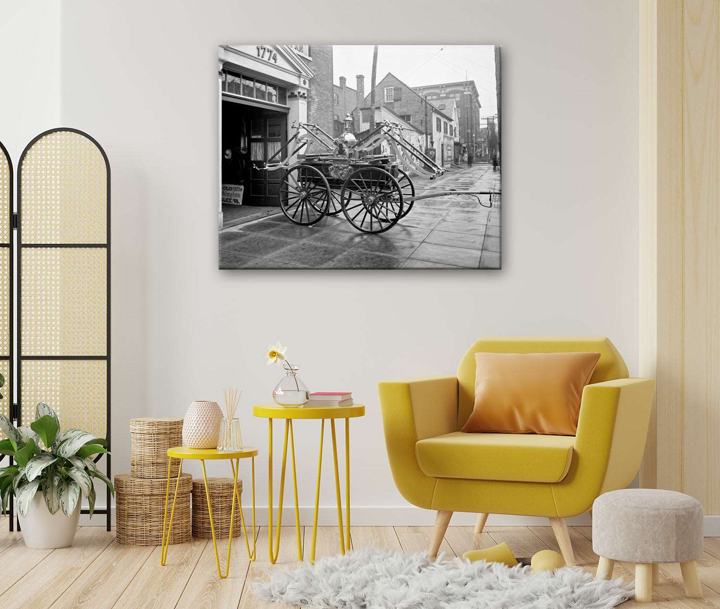 A living room with a canvas print of a vintage photograph of an old fire engine