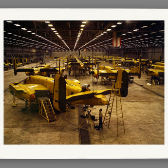 Example of a paper print reproduction of a vintage photograph of B-25 bombers being assembled