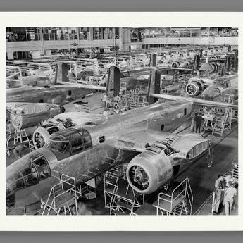 A reproduction print on paper featuring a photograph of B-25 Bombers