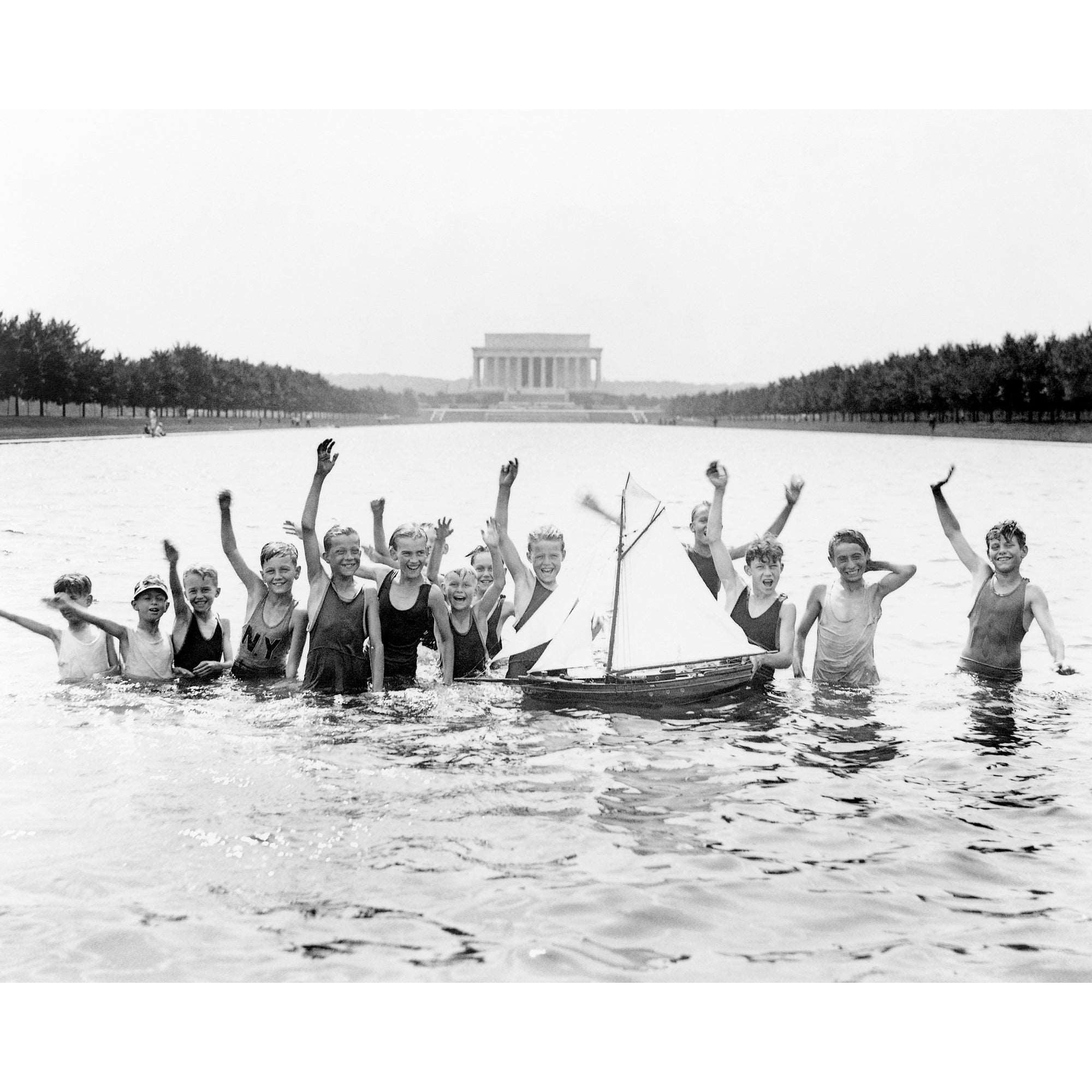 A vintage photograph of boys playing in the Reflecting Pool in Washington DC