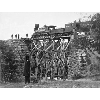 A vintage photograph of a train crossing a Bridge on the Orange and Alexandria Railroad