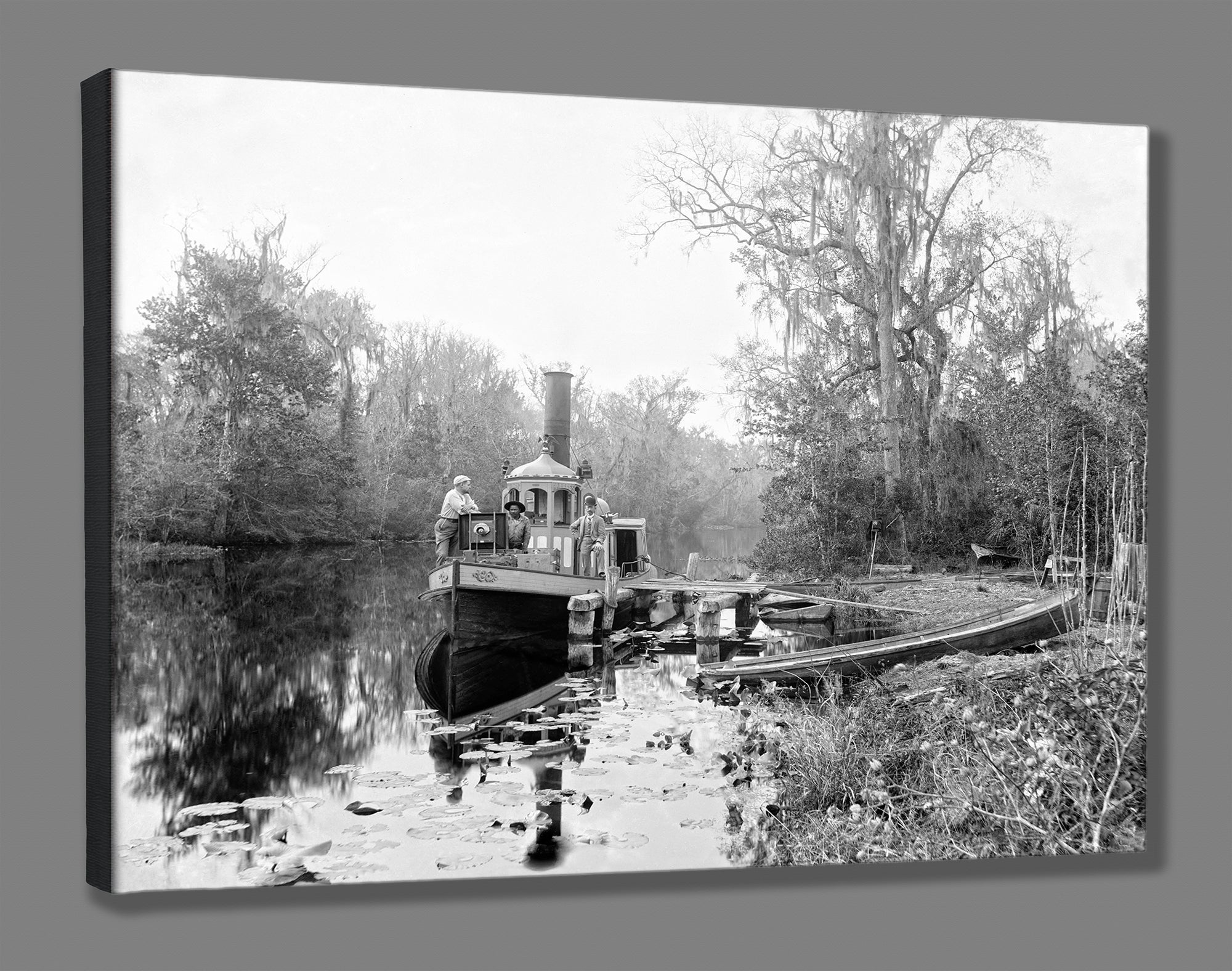 A canvas print of a vintage photograph of a boat in Rice Creek
