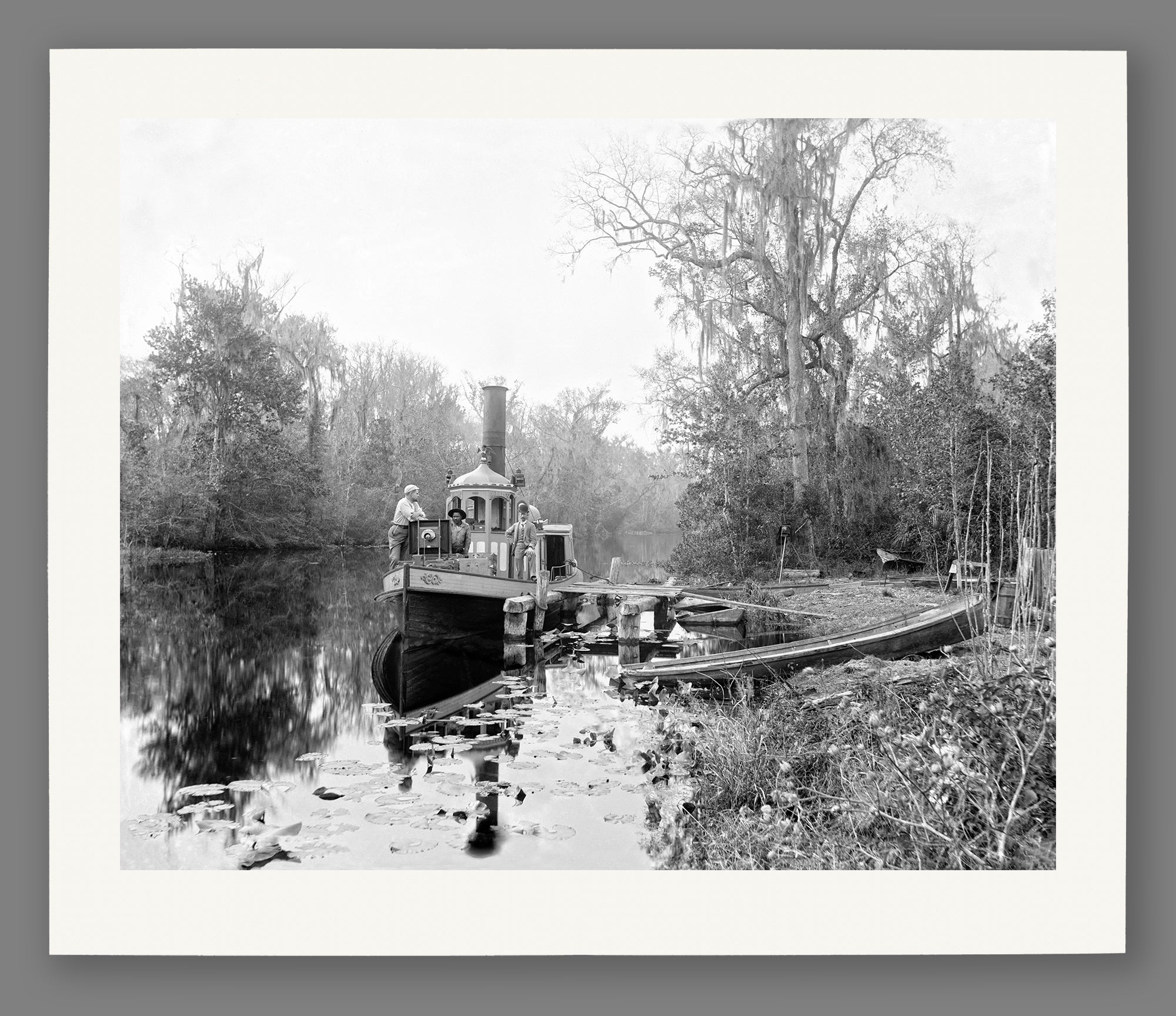 A paper reproduction print of a vintage photograph of a boat at Browns Landing