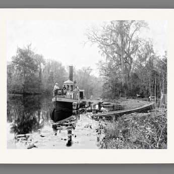 A paper reproduction print of a vintage photograph of a boat at Browns Landing
