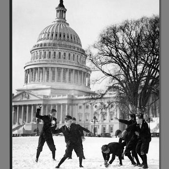 A mockup of a canvas print of a photograph of Capitol Pages having a snowball fight
