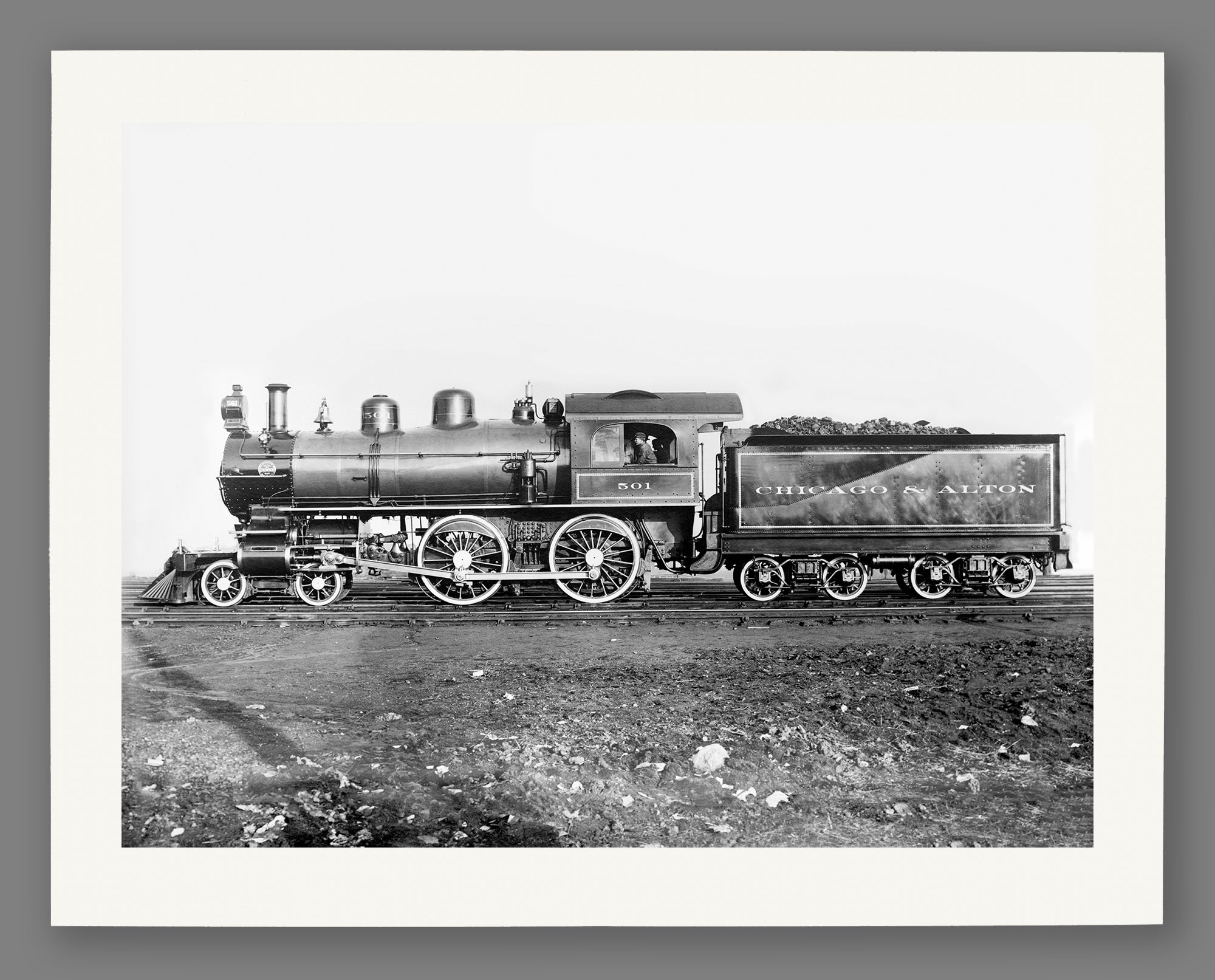 A reproduction print on fine art paper of a vintage photograph of a Chicago and Alton Railroad Engine