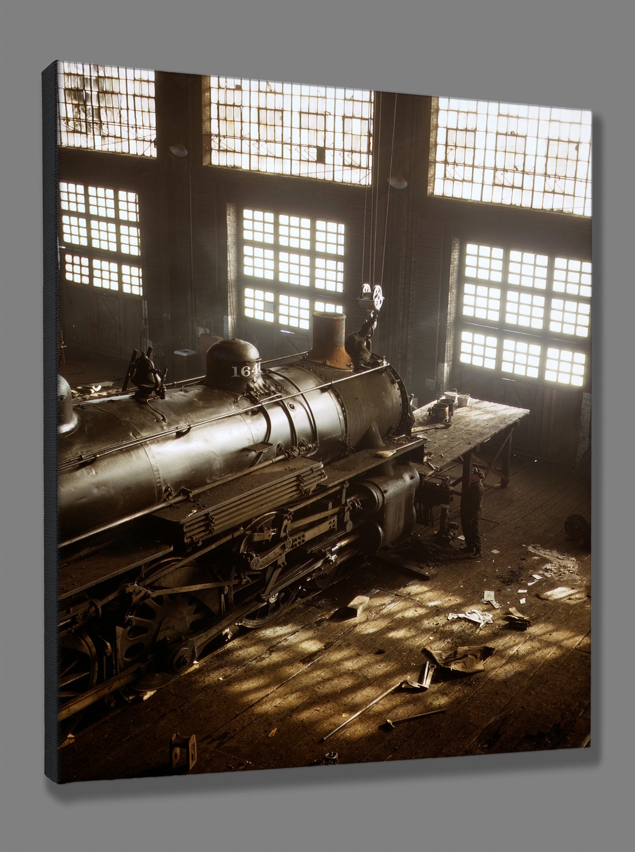 A canvas print of a vintage image of a train car in the Railroad Shops