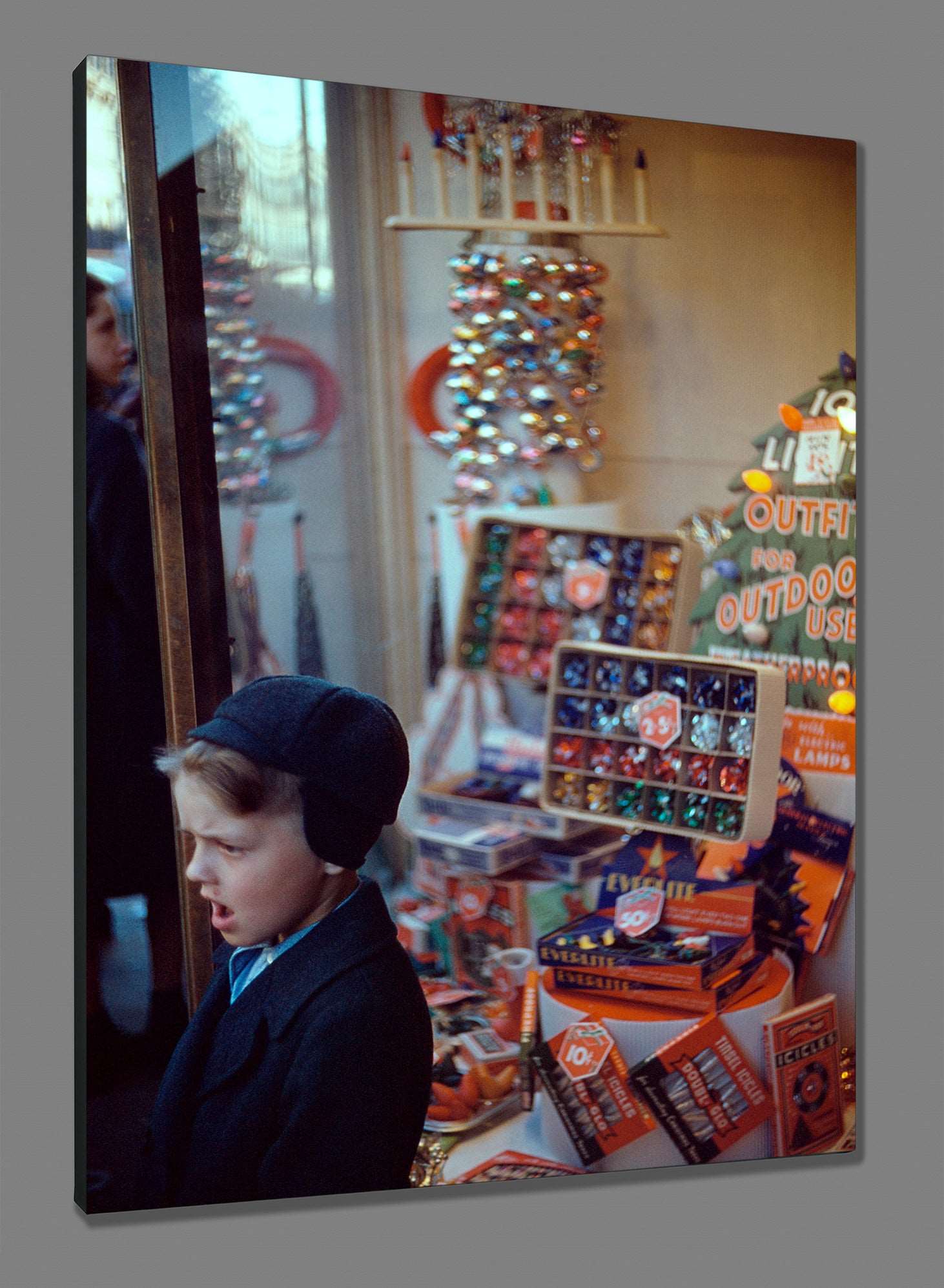 A canvas reproduction print of a vintage photograph of a store's Christmas display
