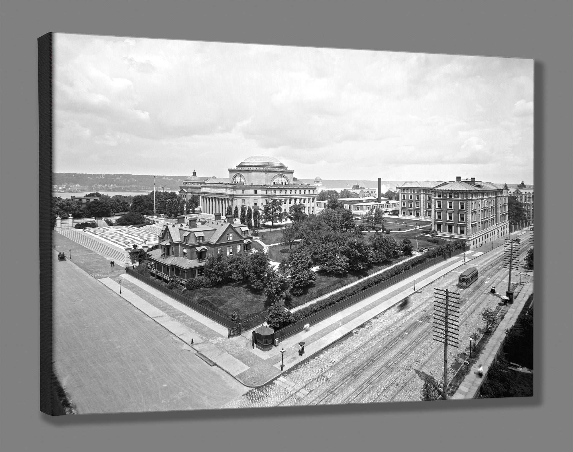 A canvas reproduction print of a vintage photograph of Columbia University with the Hudson River in the background